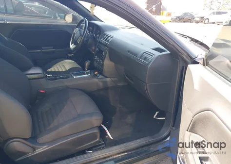 2013 Dodge Challenger Sxt z USA, uszkodzony, nr VIN 2C3CDYAG7DH676141